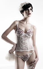 Embroidered lace bustier with lace up front.